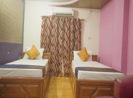 Hotel O Chitra، فندق في Alīpur Duār