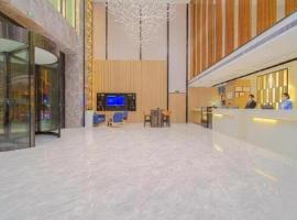 Echarm Hotel Foshan West Station Shishan Luocun, hotel em Luocun
