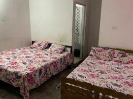 OYO 81249 Waris Lodge، فندق في كانها