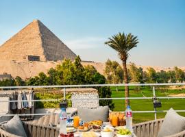Glow Pyramids View Hotel، فندق في القاهرة
