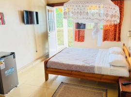 Kigali cosmos hotel, hotel en Nyamabuye