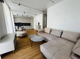 Apartamentai parke, prie upės