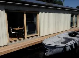 B&Boathouse Amsterdam with bikes and motorboat