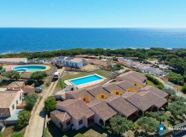 residence baia sant anna con piscina, hotel a Tanaunella