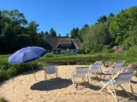 Exklusives Reetdach-Ferienhaus mit Sauna, Whirlpool & Privatgarten - bis 10 Personen