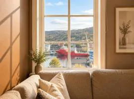 Bright Nordic apartment with sea & mountain views