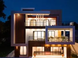 ELIVAAS Nedumbally 4 BHK Villa with Office Space, Balcony Sit-Out & Lounge Area Near Edapally Church