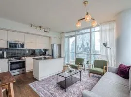 Downtown 2BR condo with city views and free parking