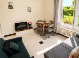 Deux pièces cosy au coeur d'un jardin fleuri