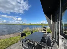 De IJssel Eilanden Chalet Steg SixtySix Kampen mit Zaun Nr 766