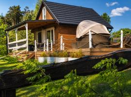 Domek letniskowy na Kaszubach z Balia ogrodowa, hotel di Gowidlino