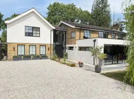 Lovely large modern home in private wooded estate