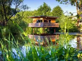 Tiny House über dem Pferdeteich mit Kamin, Fasssauna & großer Terrasse - für Kurzentschlossene