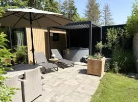 Wellnesslodge Scholekster met jacuzzi en uitzicht