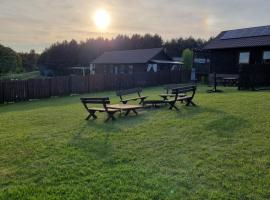 Domki letniskowe Przy Kasztanie, Hotel in Wiele