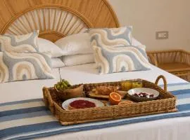 LIGEA APARTMENT - Bright Mediterranean Home with Bali-Inspired Touches - Central Anzio near Sea, Train and Bus Station
