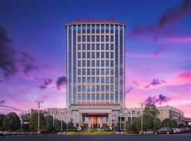 Landison Grand World Hotel Dongyang Garden Hotel، فندق في Longfengshan