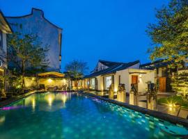 Floral Hotel Zerunju Light Luxury Guesthouse, hotel u gradu 'Tongxiang'
