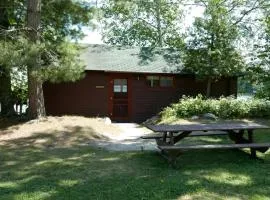 Serene Lakefront Cabin with Picture-Window Fishing Beside Covered Boathouse in Orr, Minnesota