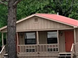 Modern Cabin with Gorgeous Wood Paneled Walls Nestled in the Scenic Beauty of the Ozarks