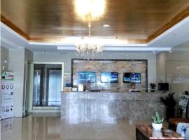 GreenTree Inn Wuxi New District Shengang World Express Hotel، فندق في Fangqian