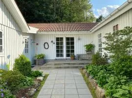 Idyllically Situated Wooden House By The Forest