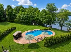 Lakefront Retreat w/ Pool & Boats – Sleeps 12