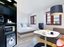 Novotel Suites Perpignan Centre - Grandes Suites & Confort Centre-Ville, hôtel à Perpignan