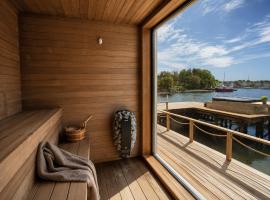 Luxury cabin near Bergen - Hot Tub & Sauna - waterftont- Beach - Private dock, Hotel in Herdla