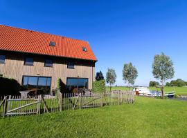Stylish Frisian Villa with Garden, Hotel in Leons