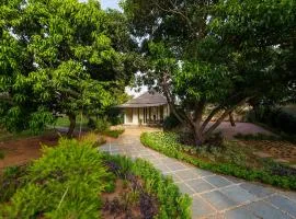 Orchard At Sarai - Luxury Tent Villas, Swimming Pool, Large lawns, & Pet friendly