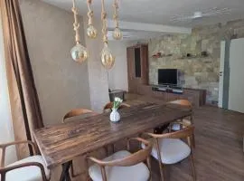 Stylish 2BR Retreat 5m Walk to Sea Garden & Beach