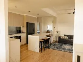 Pet-Friendly 3BR Home with Workspace & Creek Views