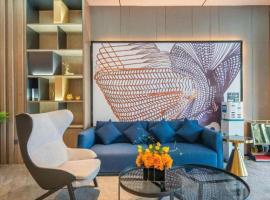 Echarm Hotel Zigong Machishui Wanda Plaza, hotel i Shuping