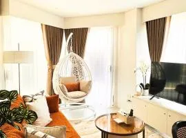 Cozy 1BR Corner Apartment with Spacious Balcony at Tambuli Seaside Resort