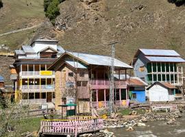 Zain Guest House, hotel i Taobat