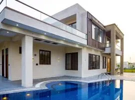 ELIVAAS Lush Haven 4 BHK Villa Private Pool, Terrace & Landscaped Garden