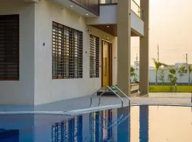 ELIVAAS Lush Haven 4 BHK Villa Private Pool, Terrace & Landscaped Garden
