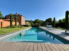 Manor house with heated pool and enclosed wooded grounds