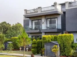 ELIVAAS Aranya Library Villas With Private Pool, Sit-out Area, Common Lounge & Garden With Forest Views