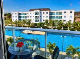 Palm Village Acqua, Vista Privilegiada das Piscinas, 3 Quartos, Até 8 Pessoas, Muro Alto，伊波茹卡的飯店