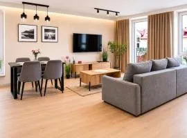 Slow Łeba Bałtycka - Klimatyzowane apartamenty z aneksami kuchennymi
