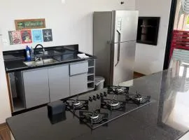 Casa confortavel com um quarto com ar-condicionado