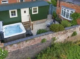 Riverside Shepherd’s Hut with Hot Tub