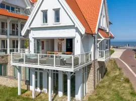 Familie beachhuis op de duinen (Duinhuis)