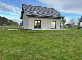 Half of a holiday home with a large garden