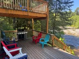 Fantastic river cabin near Mount Hood with private hot tub firepit & wood stove