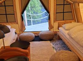 Glamping tält/tent - Glampingzelt -Lodge - Sjöutsikt, hotel i Blattnicksele