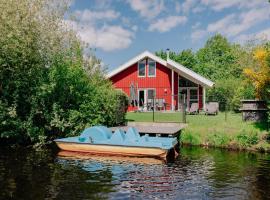 Ferienhaus Friese, direkt am See, mit hauseigenem Tretboot, hauseigener Sauna sowie Whirlpool, Kamin, eingezäuntes Grundstück, direkter nähe Kinderspieleparadies sowie Reit- und Ponyhof, hotel v destinácii Twist