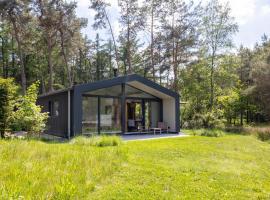Design bungalow met wellness in parkbos, hotel in Giethmen